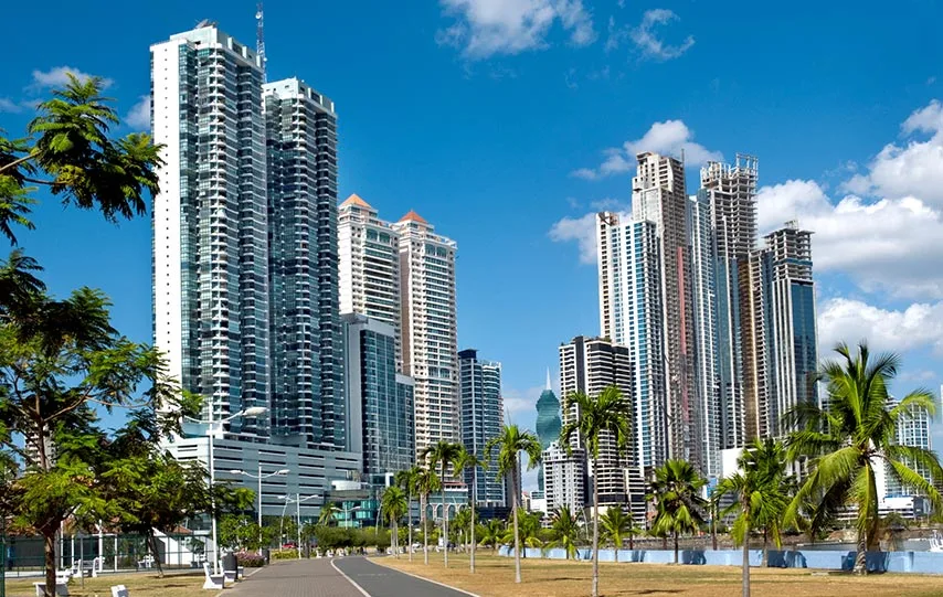 Panama City skyline with modern towers and palm trees along the waterfront
